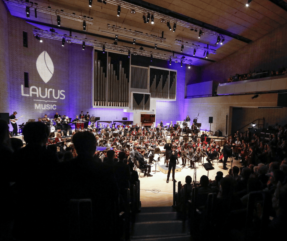 Image of Laurus students performing as an orchestra at Laurus Live.
